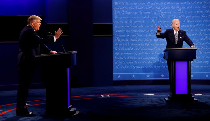 FILE PHOTO: FILE PHOTO: U.S. President Donald Trump and Democratic presidential nominee Joe Biden participate in their first 2020 presidential campaign debate in Cleveland