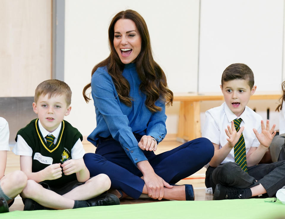 <p>Kate Middleton participates in a Roots of Empathy session with students at St. John's Primary School in Glasgow, Scotland on May 11. </p>