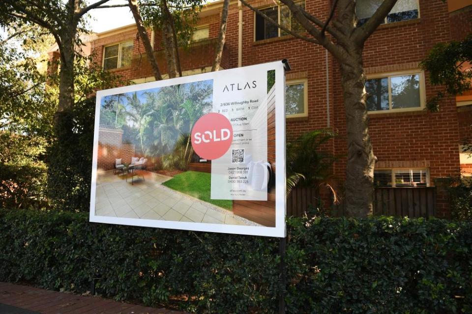 A sold sign in front of a Sydney apartment.