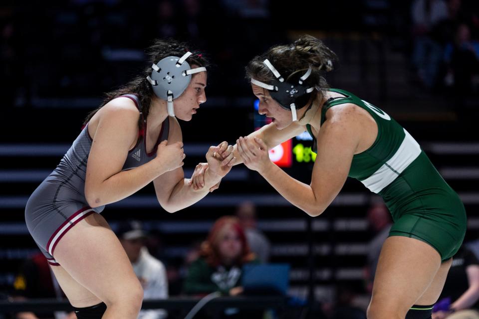 High Schoolers compete in the 5A Girls Wrestling State Championships at the UCCU Center in Orem on Thursday, Feb. 15, 2024. | Marielle Scott, Deseret News