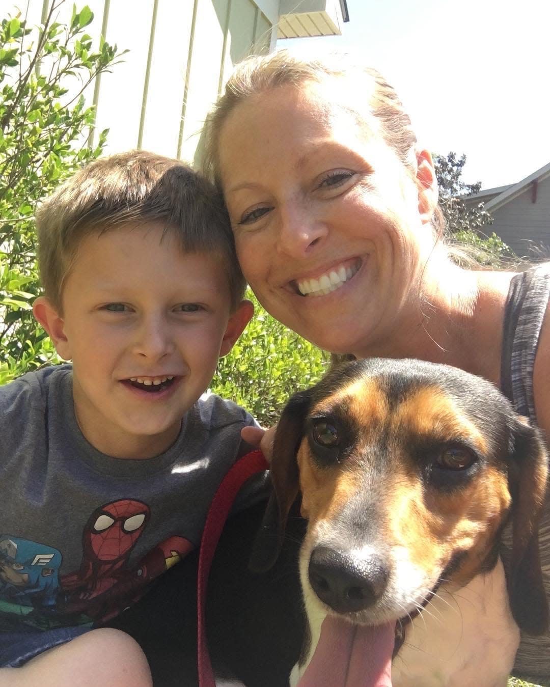 Wendi Cannon, with her son, Tyler, and beagle, Benny.