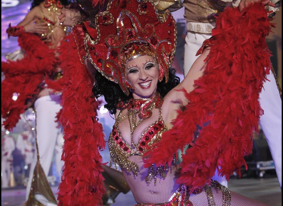 A dancer participates in the contest of 'Comparsas' (dance groups) of the carnival of Santa Cruz de Tenerife, in the Spanish Canary island of Tenerife on February 11, 2012. (DESIREE MARTIN/AFP/Getty Images)