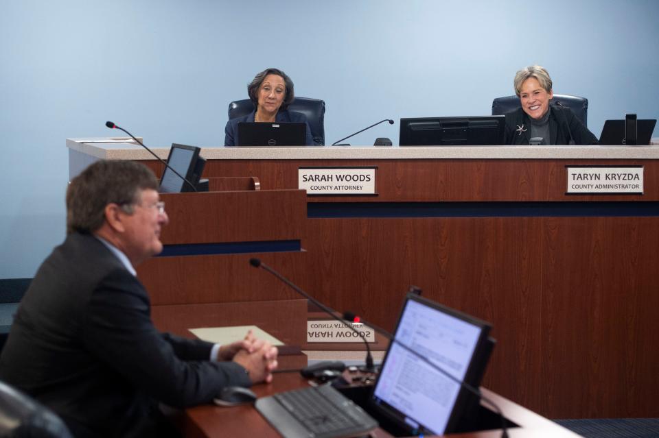 Martin County Deputy Administrator Don Donaldson (left) speaks to the County Commission after the commission approved current county administrator Taryn Kryzda (right) recommendation to fill her role after her June retirement Tuesday, Jan. 11, 2022, at the Martin County Administrative Center. Kryzda is the county’s longest-serving administrator with 11 years in the position. 