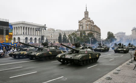 T-64 tanks drive during Ukraine's Independence Day military parade in central Kiev, Ukraine, August 24, 2016. REUTERS/Gleb Garanich