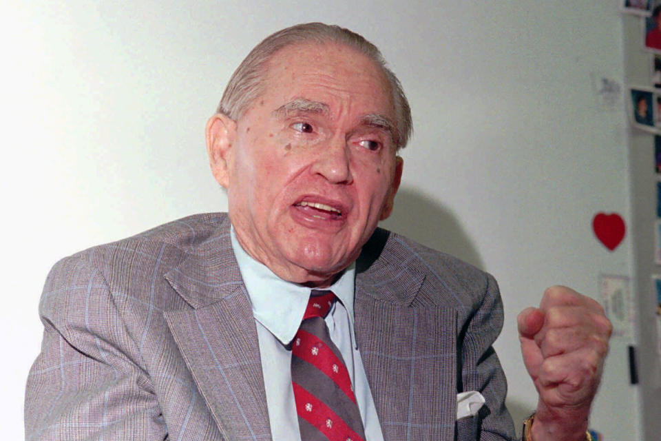 FILE - Former four-term Alabama Gov. George C. Wallace makes a rare public appearance at Dannelly Elementary School in Montgomery, Ala., in this Wednesday, May 22, 1996, file photo. The University of Alabama at Birmingham has removed the name of four-term governor and presidential candidate George C. Wallace from a campus building over his support of racial segregation. A resolution unanimously approved by trustees Friday, Feb. 5, 2021, said Wallace rose to power by defending racial separation and stoking racial animosity. (AP Photo/Dave Martin, File)