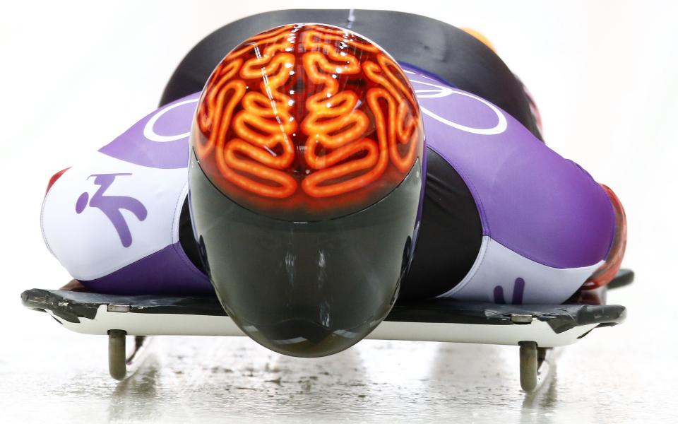 Canada's John Fairbairn speeds down the track during a men's skeleton training at the Sanki sliding center in Rosa Khutor