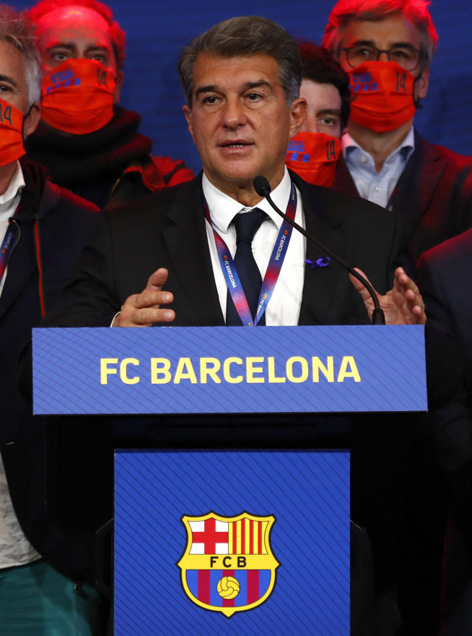 Joan Laporta celebrates his victory after elections at the Camp Nou stadium in Barcelona, Spain, Sunday, March 7, 2021. Joan Laporta has been elected Barcelona's president on Sunday, inheriting a club mired in debt and facing daunting problems that include the possible departure of Messi when his contract ends at the end of the season. (AP Photo/Joan Monfort)