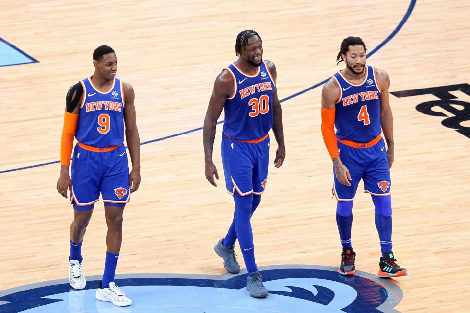 R.J. Barrett (9), Julius Randle (30) and Derrick Rose (4)