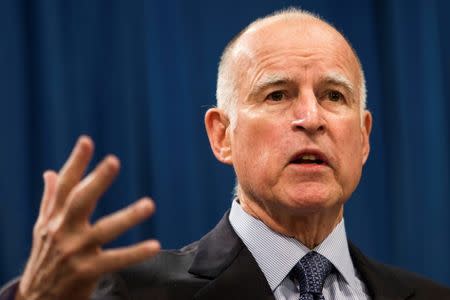 FILE PHOTO - California Governor Jerry Brown speaks in Sacramento, California, U.S. on January 9, 2014. REUTERS/Max Whittaker/File Photo