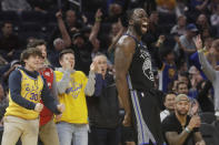 Golden State Warriors forward Draymond Green (23) celebrates after scoring against the Chicago Bulls during the second half of an NBA basketball game in San Francisco, Wednesday, Nov. 27, 2019. (AP Photo/Jeff Chiu)