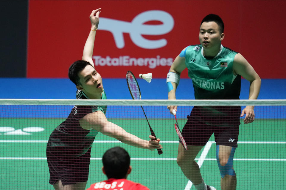 Malaysian men's doubles duo Aaron Chia (left) and Soh Wooi Yik in action at the 2022 BWF World Championships.