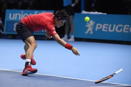 Britain Tennis - Barclays ATP World Tour Finals - O2 Arena, London - 19/11/16 Japan's Kei Nishikori drops his racquet during his semi final match against Serbia's Novak Djokovic Reuters / Toby Melville Livepic