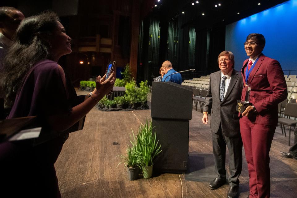 Best and Brightest Awards creator Ron Sachs takes a photo with Rickards High School senior Shreyas Kodela after the 2022 Best and Brightest awards ceremony on Wednesday, May 11, 2022 at Ruby Diamond Concert Hall in Tallahassee, Fla. 