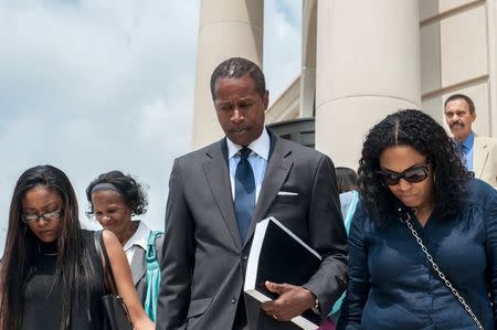 Former Democratic New York State Senator Malcolm Smith (C) leaves a federal court after being sentenced in White Plains, New York July 1, 2015. REUTERS/Stephanie Keith