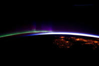 An amazing image released by Nasa shows the UK and Ireland below the stunning greens and purples lights of the Aurora Borealis. The photo was taken on 28 March by the Expedition 30 crew onboard the International Space Station flying at an altitude of about 240 miles over the eastern North Atlantic.