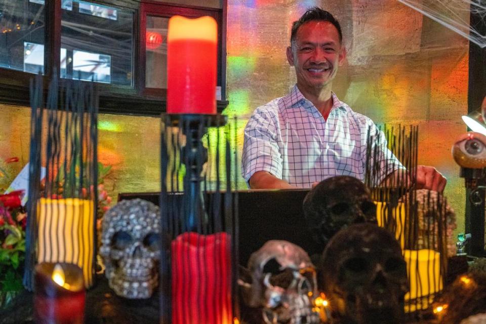 Tai Nguyen, co-owner of Cafe Trio, is getting his restaurant good and ready for Halloween.