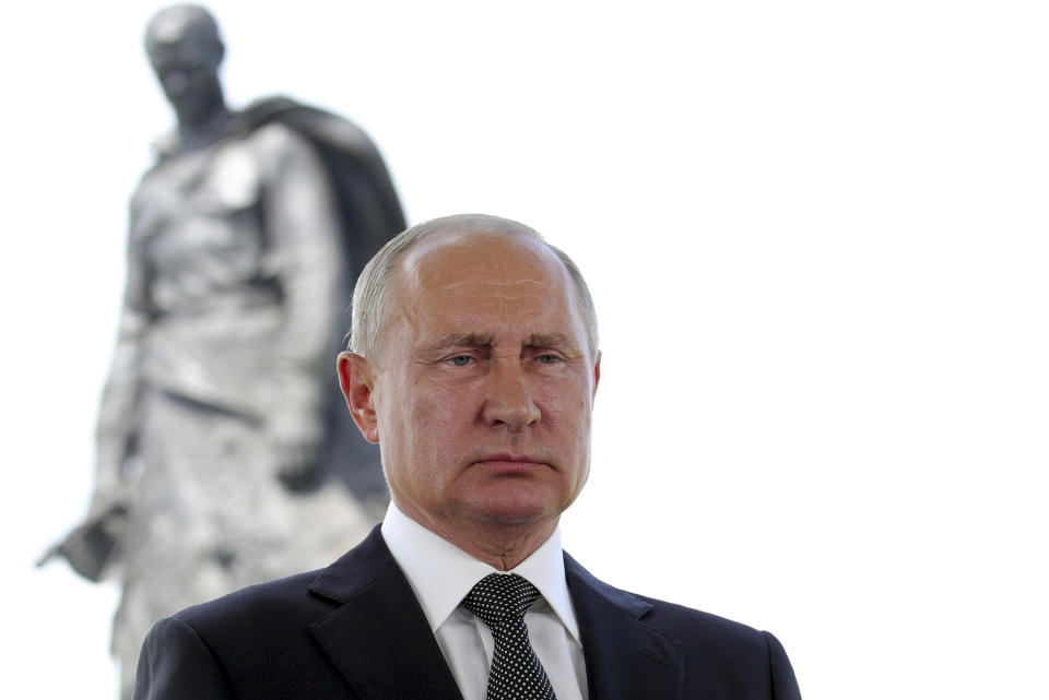 Russian President Vladimir Putin appears in a televised address to the nation in Khoroshevo, the Tver region, with a monument to World War II Red Army soldiers seen in the background, Russia, Tuesday, June 30, 2020. Putin urged voters to cast ballots in a constitutional vote wrapping up Wednesday that could allow him to extend his rule until 2036. (Mikhail Klimentyev, Sputnik, Kremlin Pool Photo via AP)