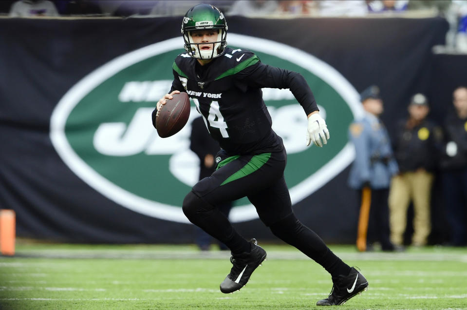 New York Jets quarterback Sam Darnold (14) runs during the first half of an NFL football game against the New York Giants, Sunday, Nov. 10, 2019, in East Rutherford, N.J. (AP Photo/Steven Ryan)