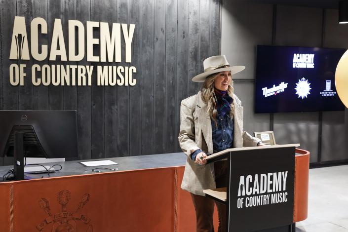 ACM New Female Artist of the Year Lainey Wilson attends a Ribbon Cutting ceremony officially opening the new Nashville headquarters at ACM Headquarters on December 14, 2022 in Nashville, Tennessee.