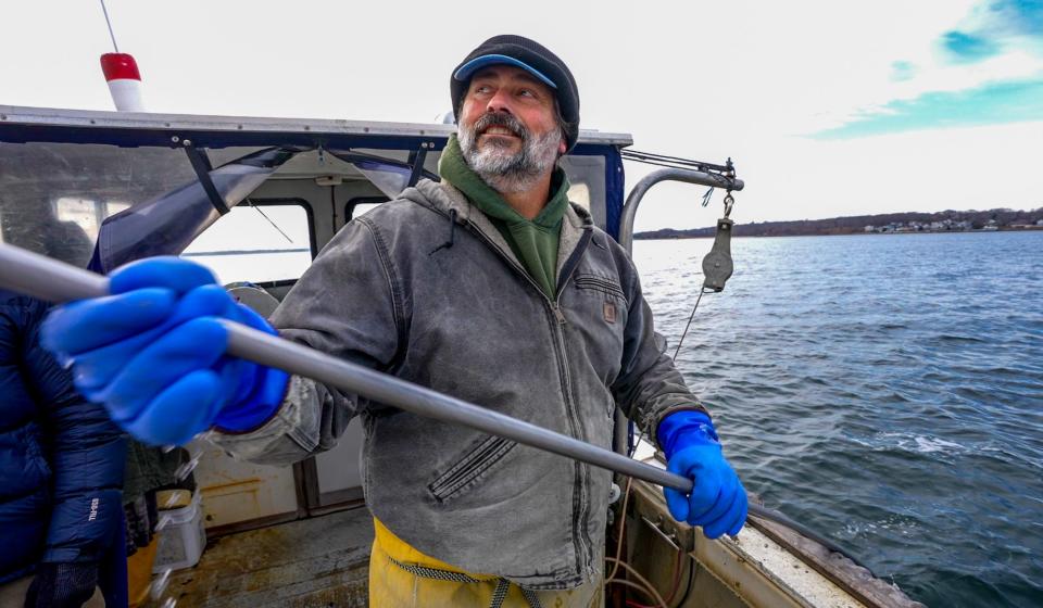 David Ghigliotty works his bullrake along the bottom of Narragansett Bay, guided by decades of experience in harvesting quahogs.