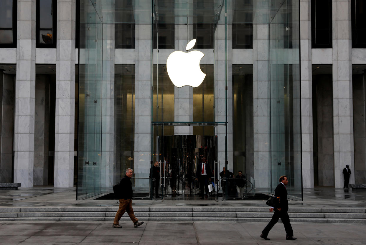 The Apple Inc. logo is seen hanging at the entrance to the Apple store on 5th Avenue in Manhattan, New York, U.S., October 16, 2019. REUTERS/Mike Segar