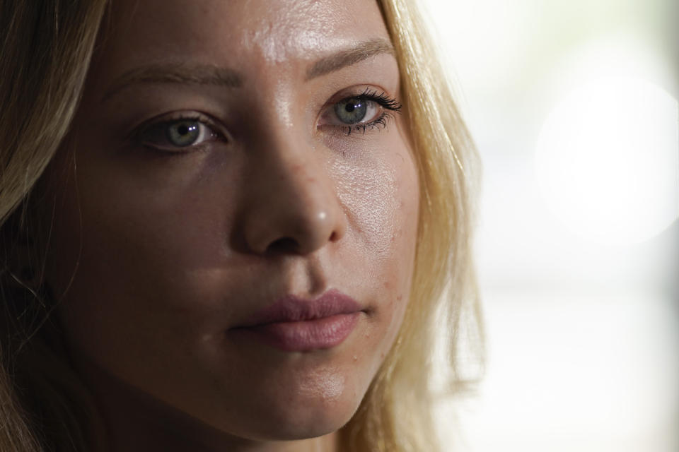 Brazilian model Najila Trindade, who has accused soccer star Neymar of raping her and who was indicted for giving false testimony, speaks to journalists at a police station in Rio de Janeiro, Brazil, Wednesday, Sept. 11, 2019. In May, Trindade accused Neymar of raping her at a Paris hotel. Neymar denied the accusation and said their relations were consensual. (AP Photo/Leo Correa)