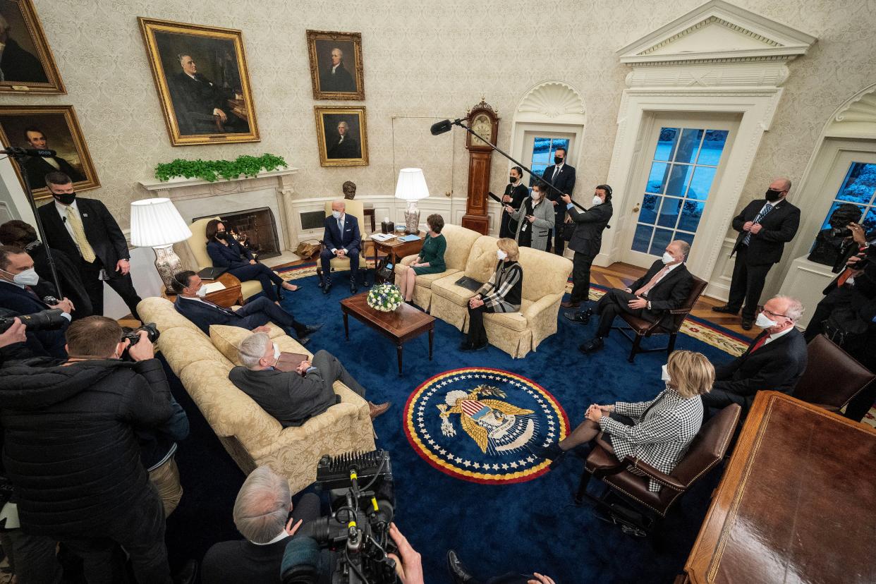 U.S. President Joe Biden (Center R) and Vice President Kamala Harris (Center L) meet with 10 Republican senators, including Mitt Romney (R-UT), Bill Cassidy (R-LA), Susan Collins (R-ME), Lisa Murkowski (R-AK), Thom Tillis (R-NC), Jerry Moran (R-KS), Shelley Moore Capito (R-WV) and others, in the Oval Office at the White House Feb. 1, 2021, in Washington, DC. The senators requested a meeting with Biden to propose a scaled-back $618 billion stimulus plan in response to the $1.9 trillion coronavirus relief package Biden is currently pushing in Congress.