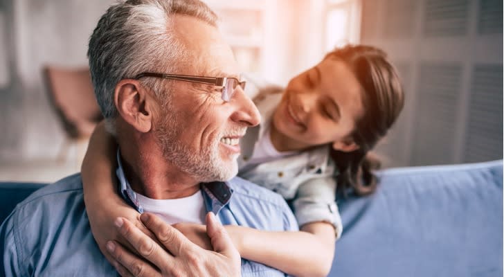 retiree spends time with his granddaughter