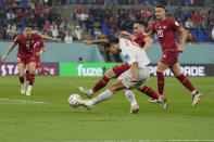 Switzerland's Ricardo Rodriguez attempts a goal during the World Cup group G soccer match between Serbia and Switzerland, at the Stadium 974 in Doha, Qatar, Friday, Dec. 2, 2022. (AP Photo/Martin Meissner)