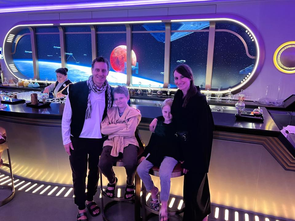 My family in the Hyperspace Lounge on the Disney Wish