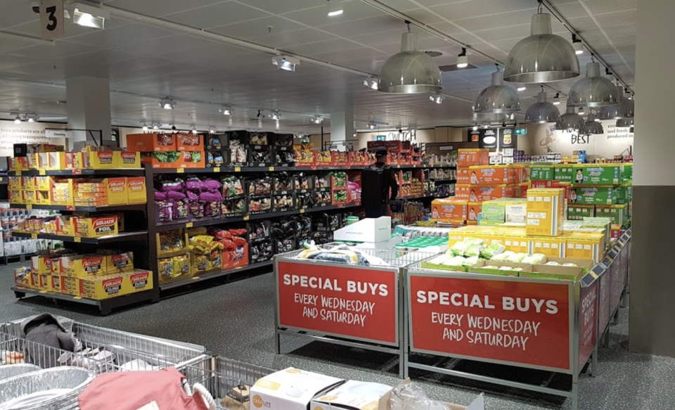 Photo shows the inside of an Aldi store.