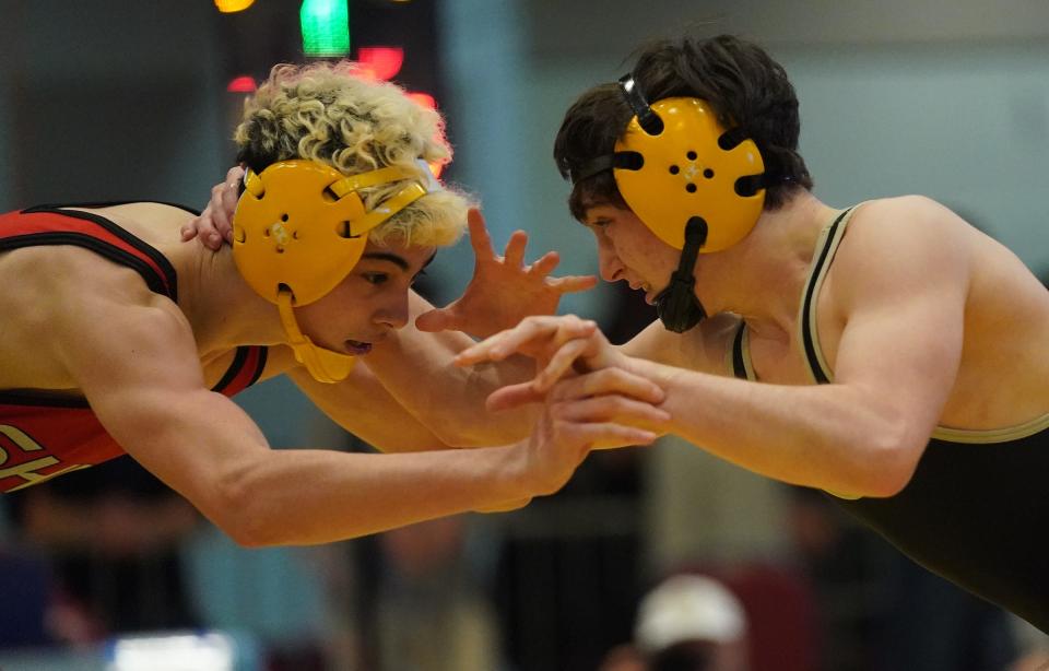Nanuet's John Parisi wrestles Sleepy Hollow's Silas Freitas-Corveddu in the 124-pound championship match at the Section 1, Division II wrestling championships at Westchester County Center on Saturday, Feb. 10, 2024.