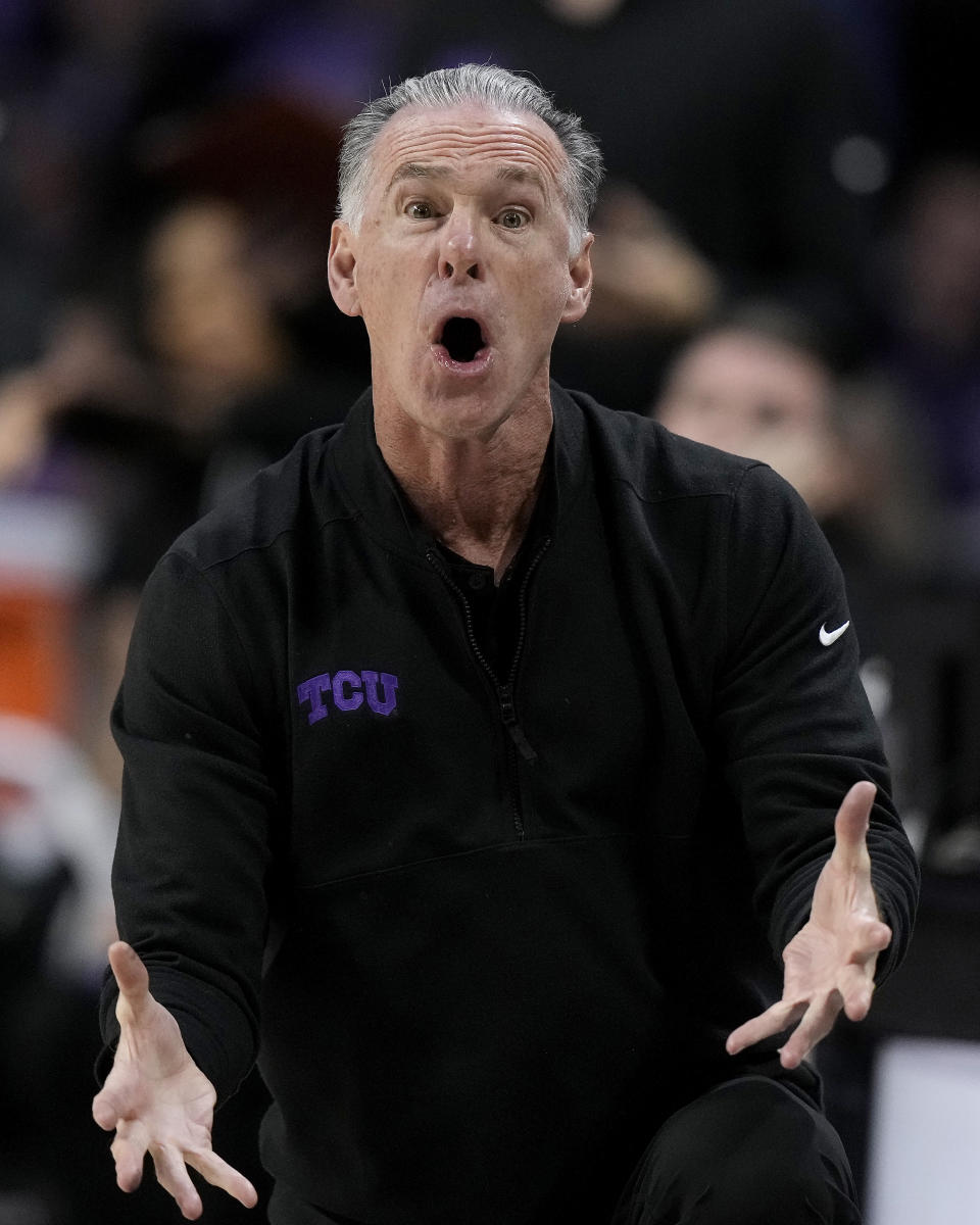 TCU head coach Jamie Dixon reacts to a call during the first half of an NCAA college basketball game against Kansas State Saturday, Feb. 17, 2024, in Manhattan, Kan. (AP Photo/Charlie Riedel)