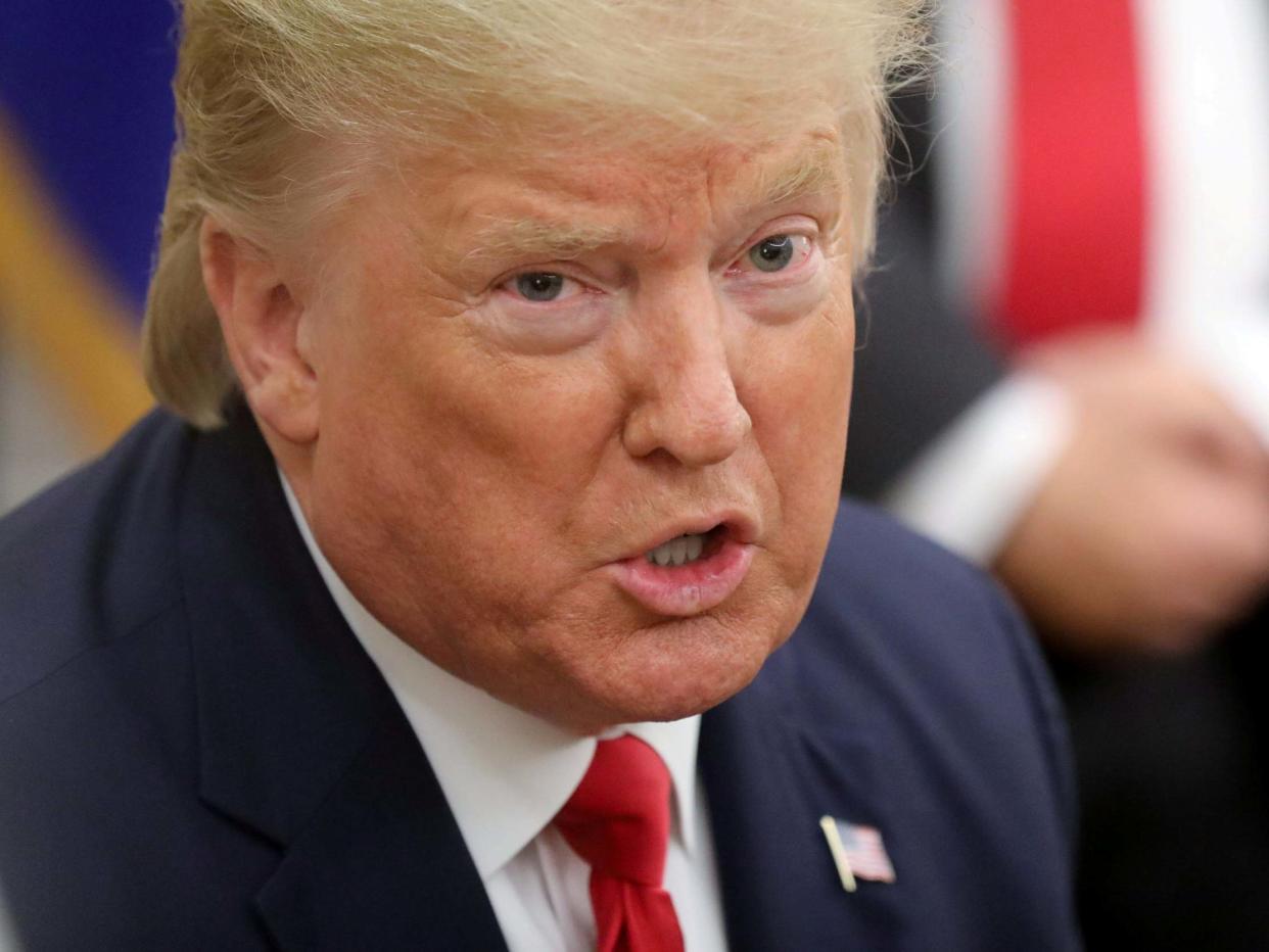 US president Donald Trump speaks to reporters in the Oval Office on 7 January 2020: Jonathan Ernst/Reuters