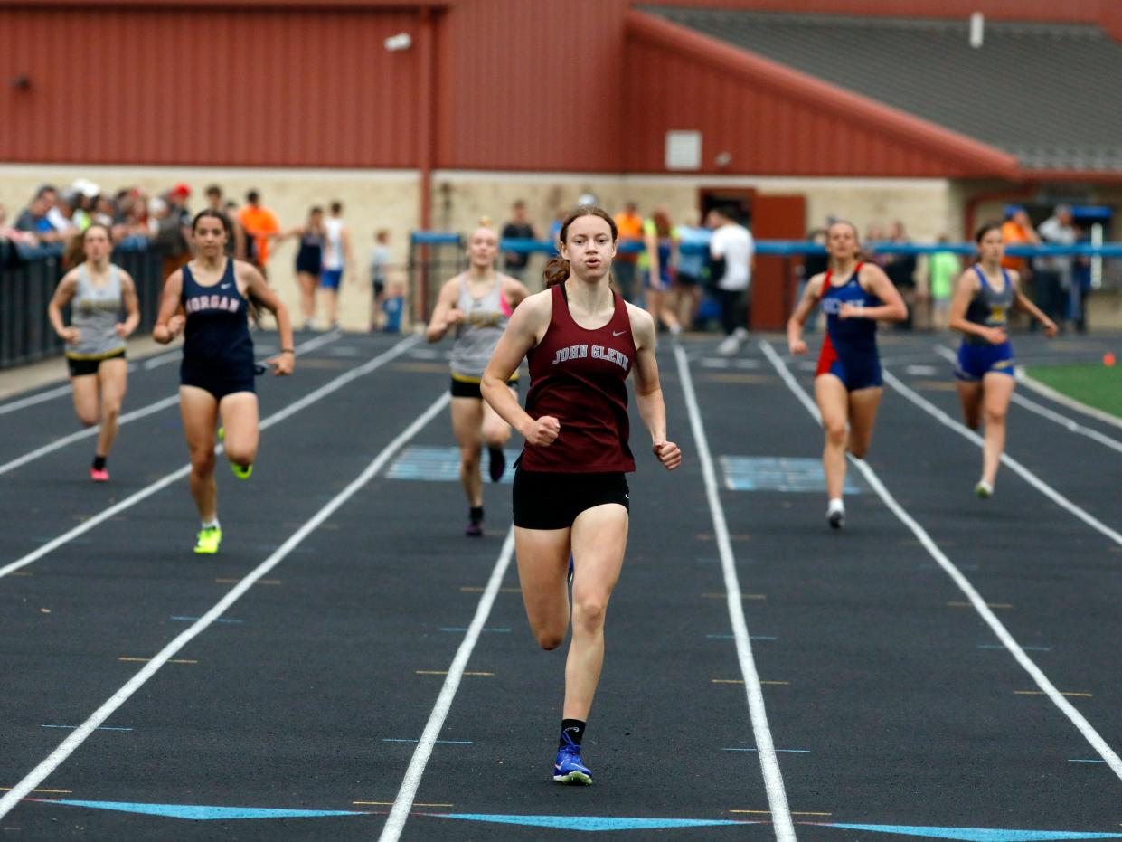 John Glenn's Jessica Church leads the pack to a win in the 400 meters during the Jerry Neal Invitational on Friday at the Maysville Athletic Complex. Church fueled the Muskies to first place.