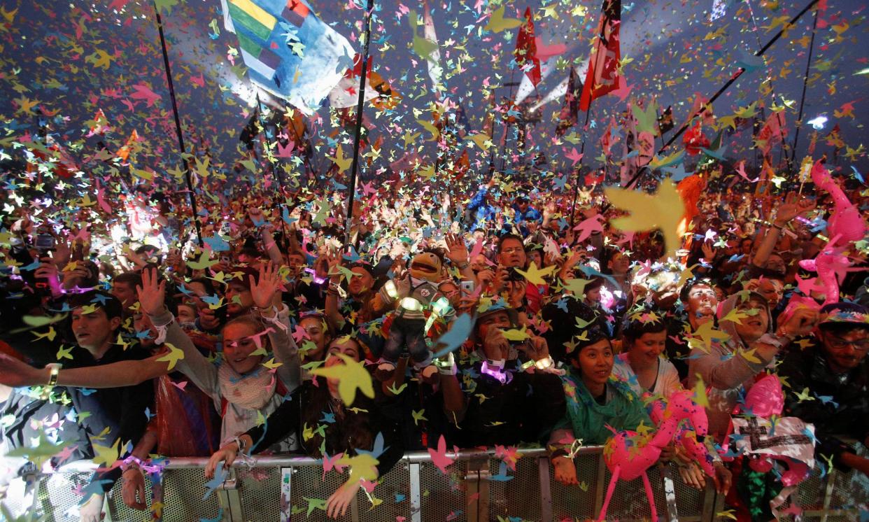 <span>Fans at Coldplay’s Pyramid stage set at Glastonbury 2016. The band return as headliners this year. </span><span>Photograph: Stoyan Nenov/Reuters</span>