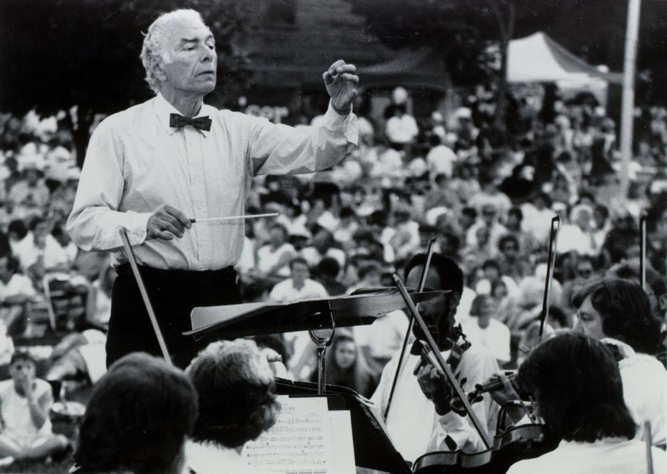 Will Schwartz conducting the Fort Collins Symphony during a performance at New West Fest in the 1990s.