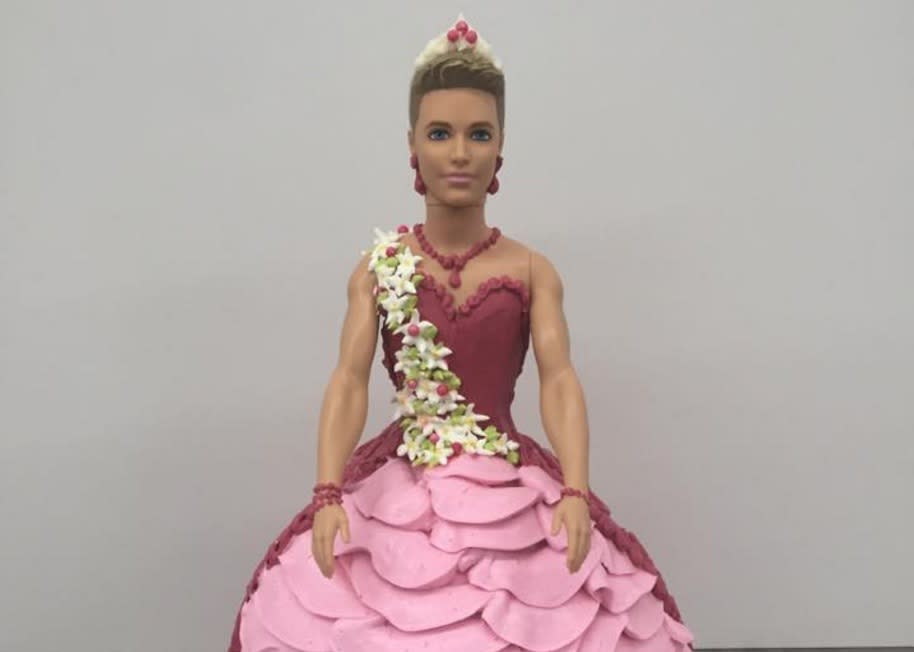 We love everything about this cake that features a Ken doll in a dress 