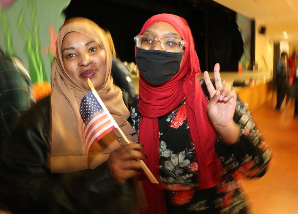 U.S. citizen Nima Yusuf, left, poses with her daughter, Safa Hassan, prior to the naturalization ceremony where Safa will receive her citizenship May 3, 2024.