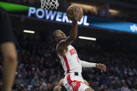 Houston Rockets guard Jalen Green shoots against the Sacramento Kings during the first half of an NBA basketball game in Sacramento, Calif., Wednesday, Jan. 11, 2023. (AP Photo/José Luis Villegas)