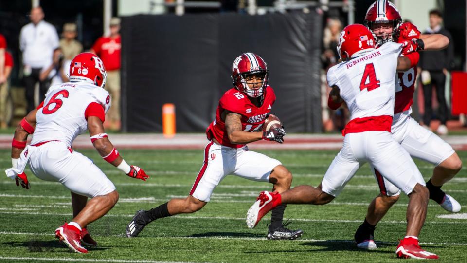 Indiana's Jaylin Lucas (12) runs during the first half of the Indiana versus Rutgers football game at Memorial Stadium on Saturday, Oct. 21. 2023.