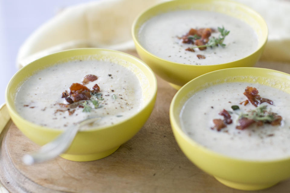 This Aug. 26, 2013 photo shows roasted cauliflower soup with bacon and thyme in Concord, N.H. (AP Photo/Matthew Mead)