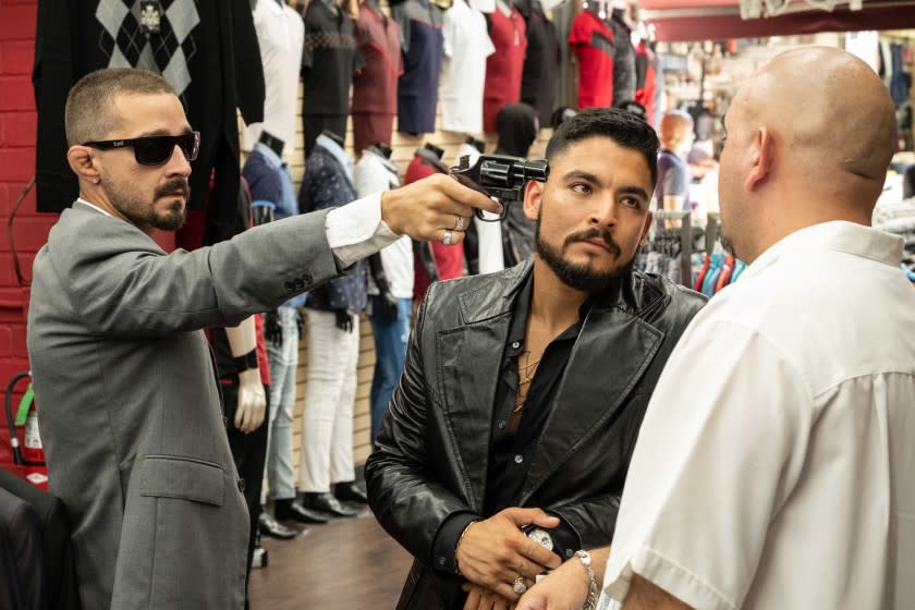 Shia LaBeouf, left, plays an enforcer for an L.A. drug family, and a right-hand man to lead Bobby Soto, in "The Tax Collector" by David Ayer.