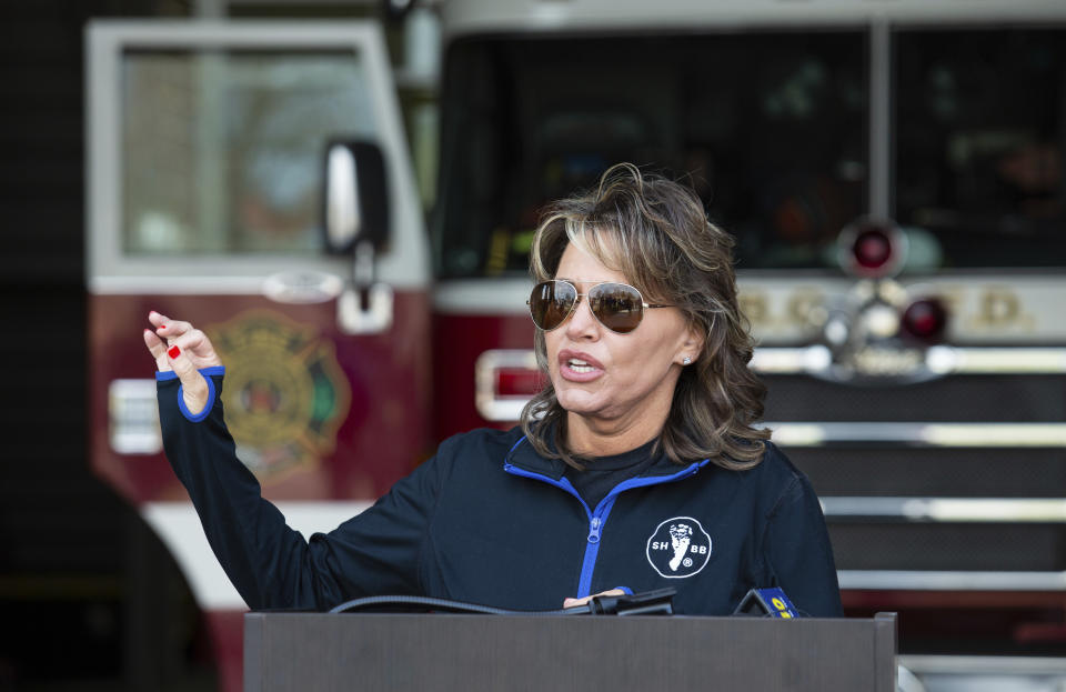 FILE — Safe Haven Baby Boxes Founder Monica Kelsey speaks at a news conference at a Bowling Green Fire Department station, Feb. 10, 2023, in Bowling Green, Ky. A fight is developing in Florida's legislature over a measure that would allow fire stations and hospitals to install boxes where distressed mothers could leave their unwanted newborns. The Indiana-based group Safe Haven Baby Boxes is pushing the measure. It passed the House recently and is now before the Senate, where there is an attempt to block it. (Grace Ramey/Daily News via AP, file)