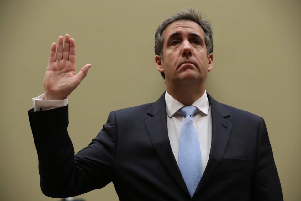 Michael Cohen, former attorney and fixer for President Donald Trump is sworn in before testifying before the House Oversight Committee on Capitol Hill February 27, 2019 (Getty Images)