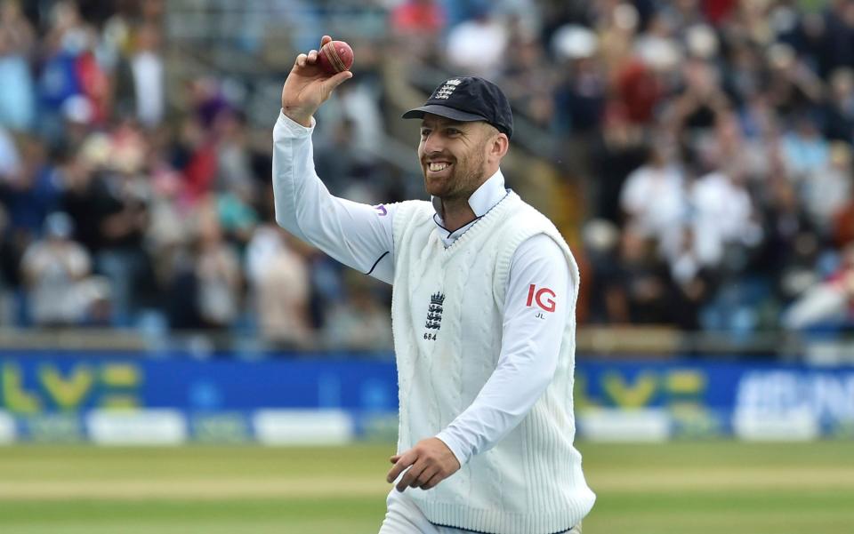 England's Jack Leach celebrates after taking five wickets during the fourth day of the third cricket test match between England and New Zealand at Headingley in Leeds, England, Sunday, June 26, 2022. - AP