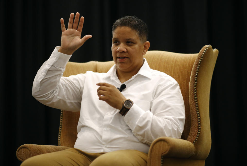 FILE - In this Aug. 31, 2018, file photo, Kerri Evelyn Harris, Democratic candidate for U.S. Senate in Delaware, speaks at a town hall, at the University of Delaware in Newark, Del. Harris, whose resume includes loading giant Air Force cargo planes, frying chicken at a convenience store chain and working as an auto body mechanic, is seeking in the Thursday, Sept. 6, Democratic primary to unseat three-term incumbent U.S. Sen. Tom Carper, one of the most successful politicians in Delaware history. (AP Photo/Patrick Semansky, File)