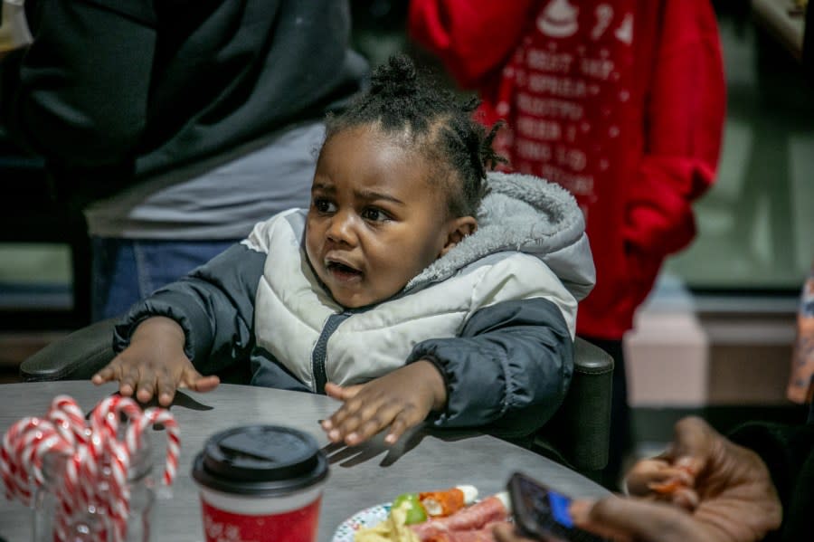 The Angel Tree Christmas Party at Talsma Furniture near Grand Rapids on Nov. 30, 2023. (Michael Buck/WOOD TV8)