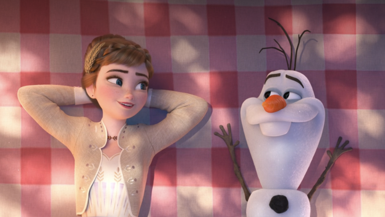  Anna and Olaf laying down in Frozen II. 