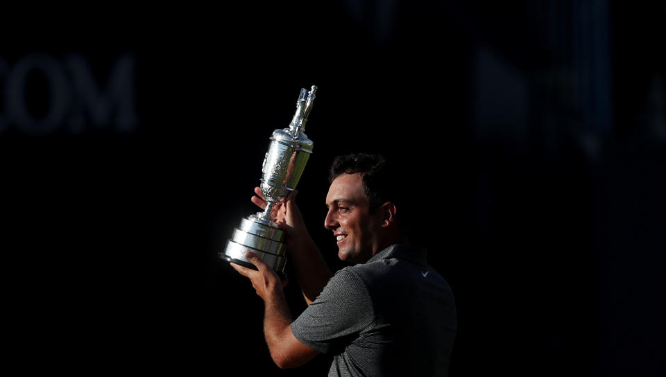 <p>Italy’s Francesco Molinari lifts The Open’s Claret Jug after winning at Carnoustie. Molinari played a key role in Europe’s Ryder Cup win, becoming the first player to win five matches. He partnered Tommy Fleetwood in the fourballs and foursomes. He also won the European Tour’s Race to Dubai title (David Davies/PA). </p>